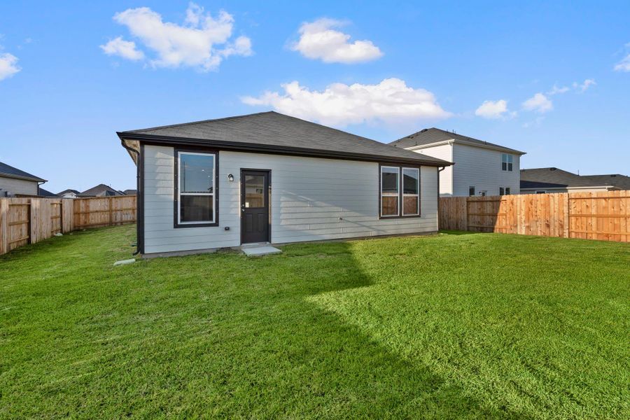 Exterior details and patio area of a home in Windcress, Baytown (Image 4). Exterior details and patio area of a home in Windcress, Baytown (Image 4).