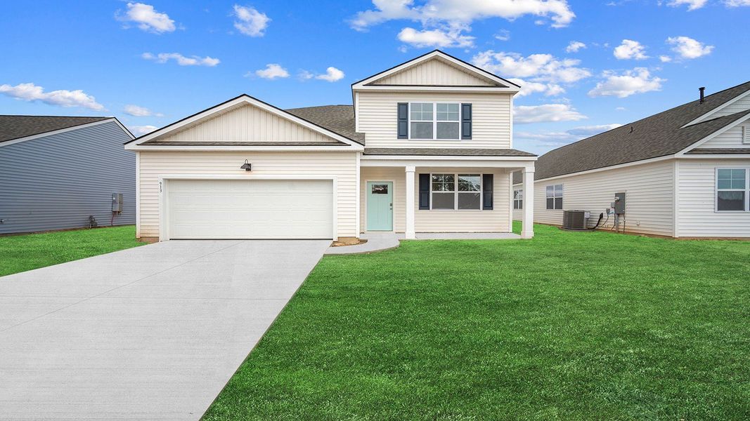 Representative exterior photo of a completed home built from the Salem by D.R. Horton in The Retreat at East Argent, Ridgeland, SC (Image 1).