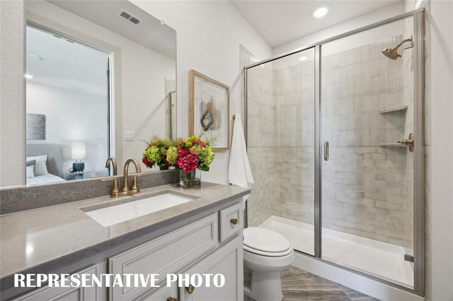 Guest baths that friends and family will love are plentiful in our homes in Painted Tree Woodlands West!  REPRESENTATIVE PHOTO OF MODEL HOME