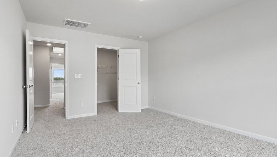Spacious, unfurnished interior of a new home in Townes at Tap Root Farms, Fletcher (Image 11). Spacious, unfurnished interior of a new home in Townes at Tap Root Farms, Fletcher (Image 11).