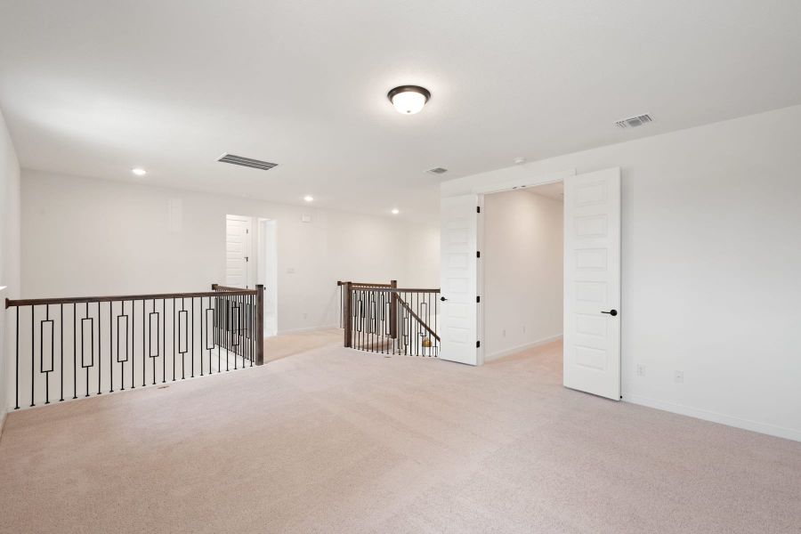 Spacious, unfurnished interior of a new home in Wolf Ranch, Georgetown (Image 44).