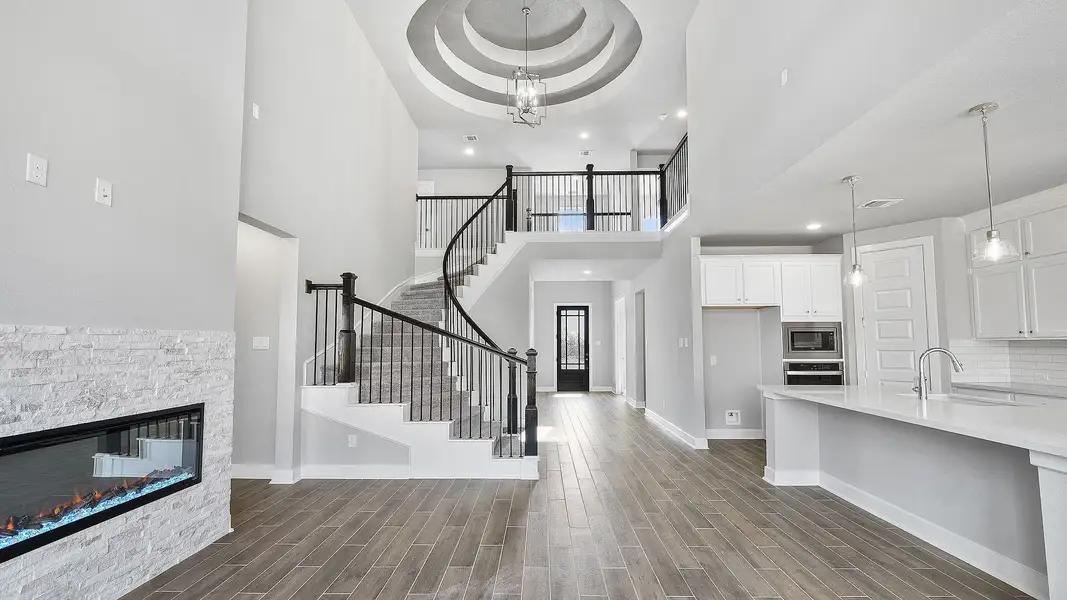 Furnished interior view inside a new home in Sunterra, Katy (Image 3).