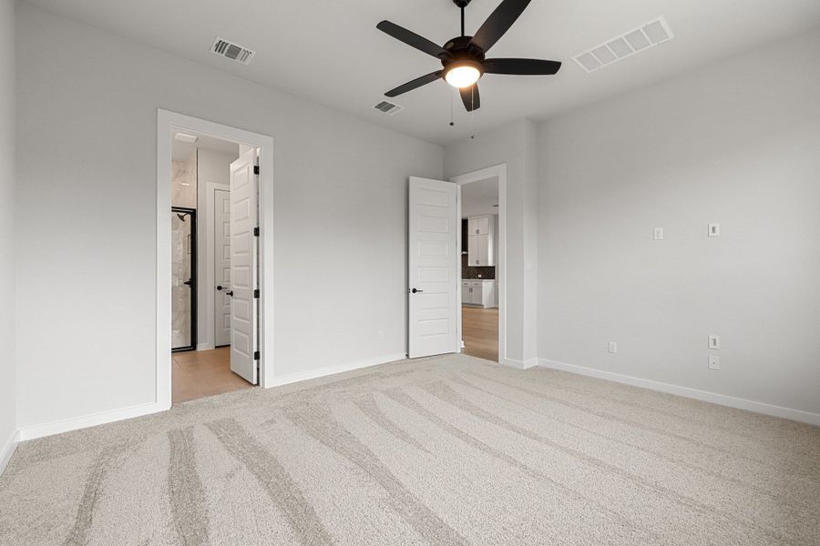 Spacious, unfurnished interior of a new home in Heritage, Dripping Springs (Image 42).
