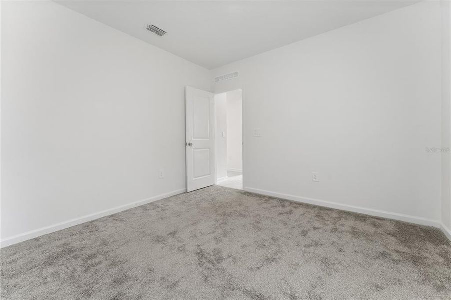 Spacious, unfurnished interior of a new home in Lawson Dunes, Haines City (Image 19).