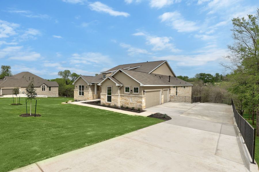 Front exterior of a new home in Double Eagle Ranch, Cedar Creek, TX, highlighting curb appeal (Image 18).