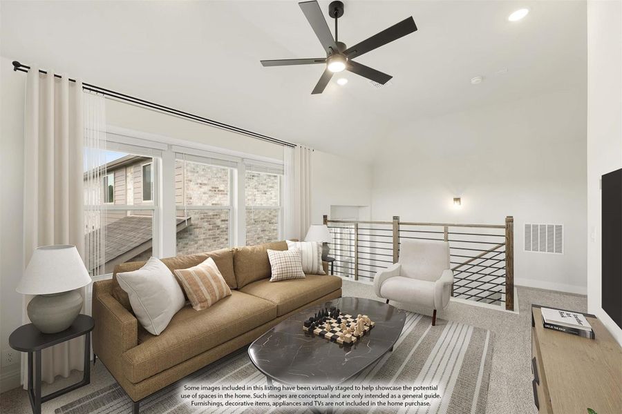 Loft living room with vaulted ceiling, ceiling fan, tan sofa, and open railing staircase overlook