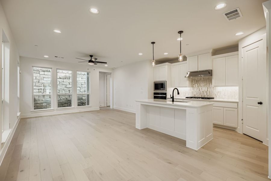 Furnished interior view inside a new home in Castle Hills Northpointe - Townhomes, Carrollton (Image 9). Furnished interior view inside a new home in Castle Hills Northpointe - Townhomes, Carrollton (Image 9).