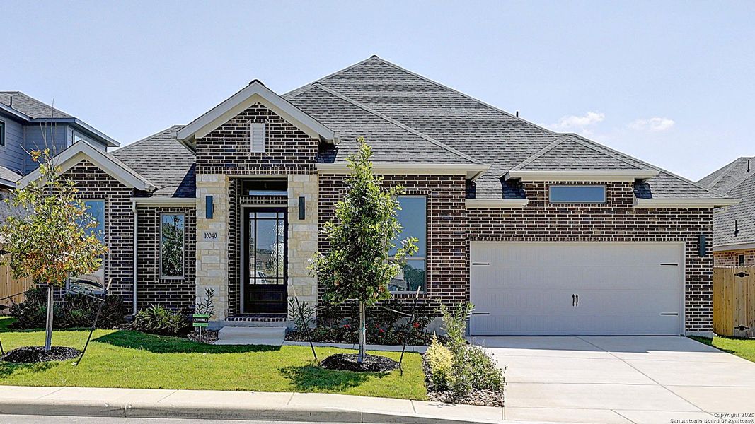 Front exterior of a new home in Kallison Ranch 60', San Antonio, TX, highlighting curb appeal (Image 2).