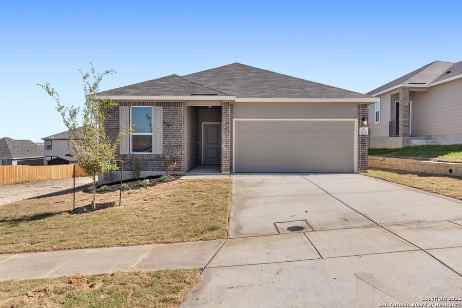Front exterior of a new home in Knox Ridge, Converse, TX, highlighting curb appeal (Image 2).