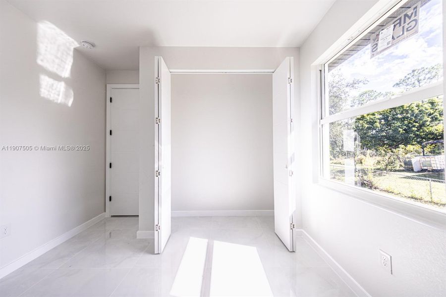 Spacious, unfurnished interior of a new home in , Lehigh Acres (Image 13).