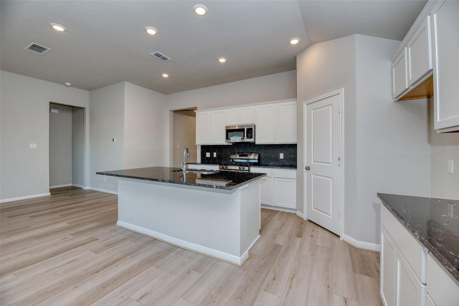Furnished interior view inside a new home in Aldeana - Paintbrush Collection, Bonney (Image 9).