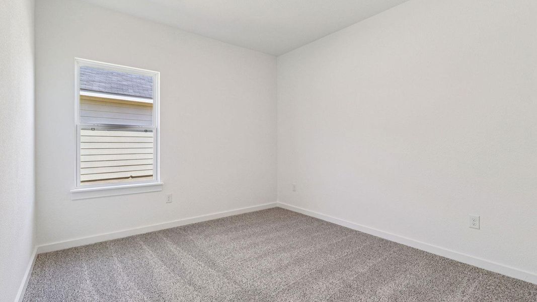 Spacious, unfurnished interior of a new home in Monarch Ranch, Manor (Image 13).