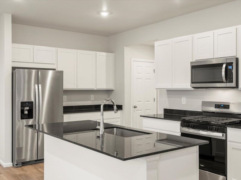 Furnished interior view inside a new home in Lorson Ranch: The Trail Collection, Colorado Springs (Image 3).