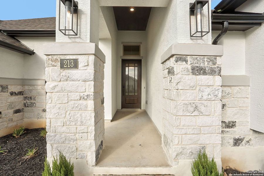 Exterior details and patio area of a home in Legacy at Lake Dunlap, New Braunfels (Image 23). Exterior details and patio area of a home in Legacy at Lake Dunlap, New Braunfels (Image 23).