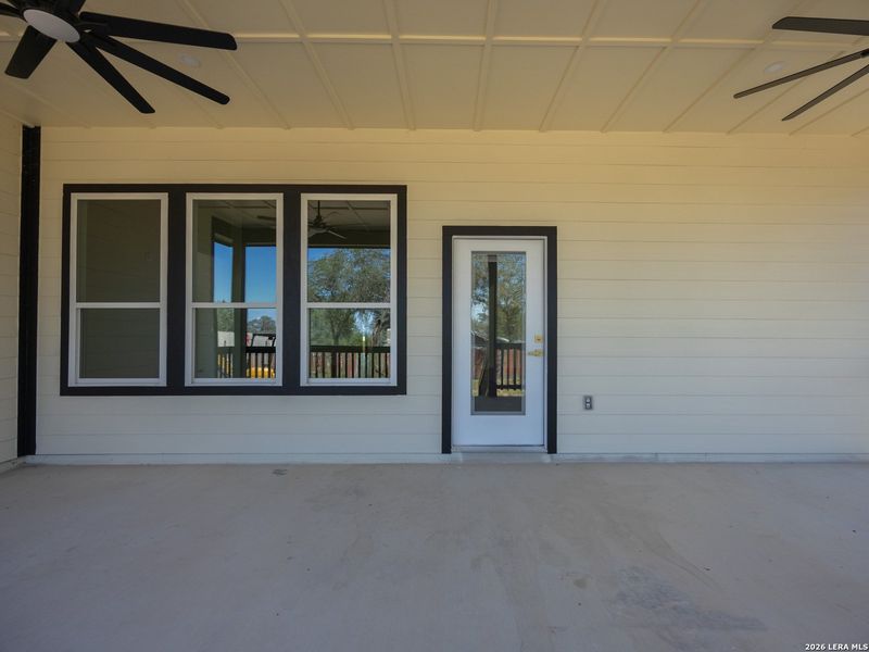 Exterior details and patio area of a home in , Elmendorf (Image 29).