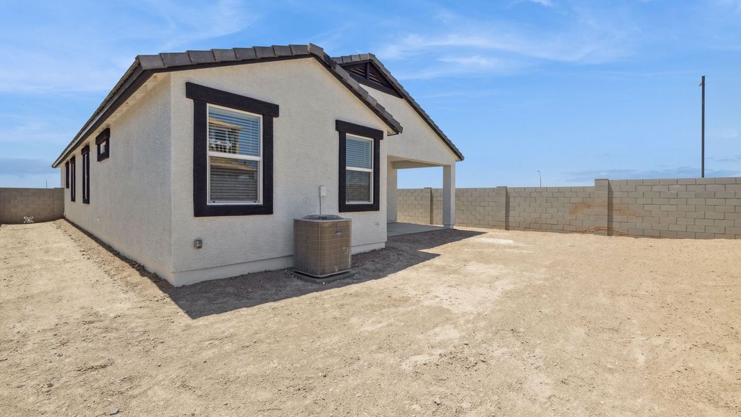 Exterior details and patio area of a home in Apache Farms, Buckeye (Image 20).