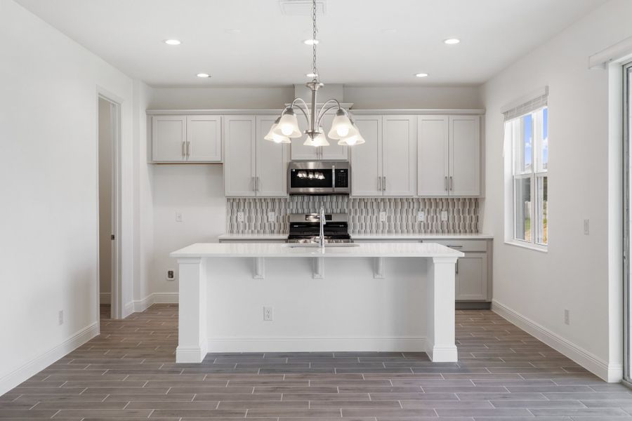 Representative furnished interior of a home built from the Newcastle by Risewell Homes in Park View at the Hills, Minneola (Image 7).