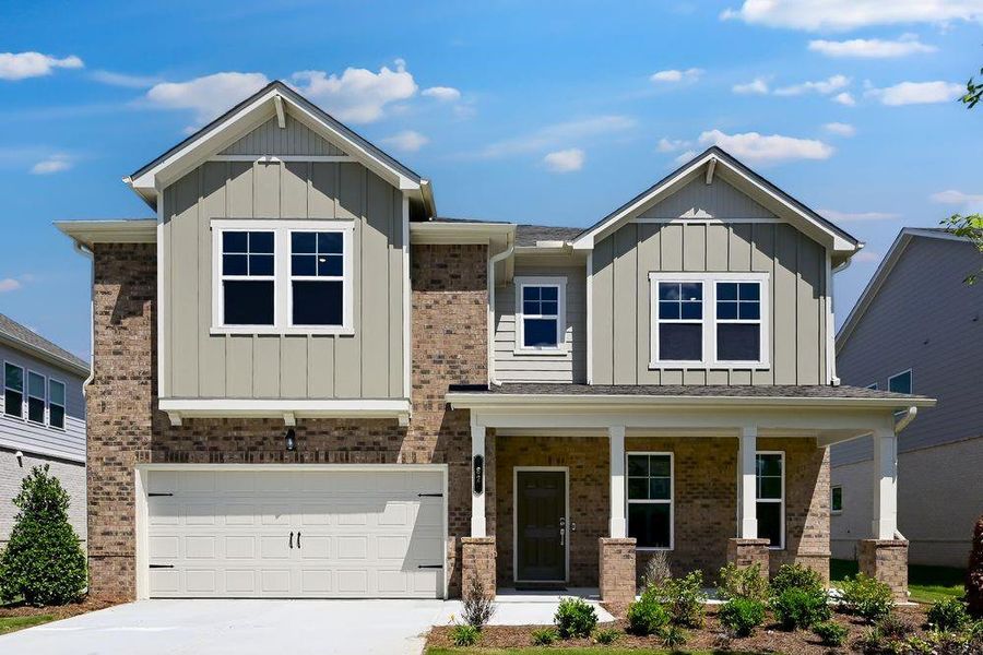 Front exterior of a new home in Bennett Farm, Loganville, GA, highlighting curb appeal (Image 1).