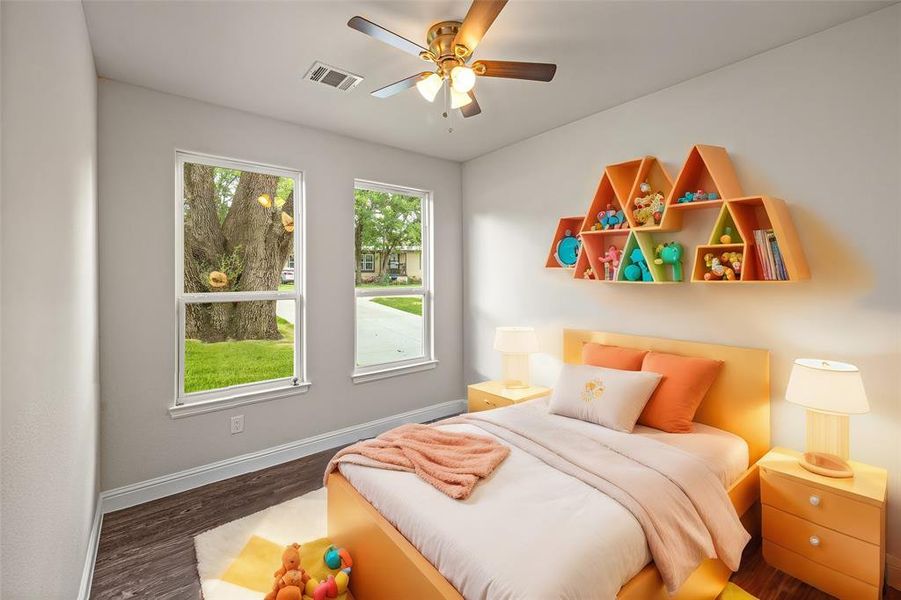 Bedroom with dark wood-type flooring and ceiling fan