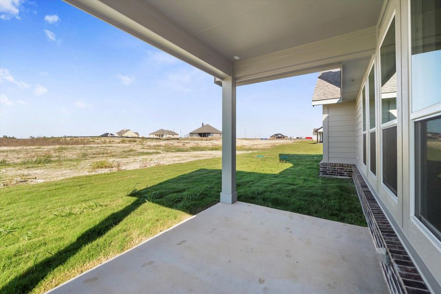 Exterior details and patio area of a home in Clear Sky Addition, Valley View (Image 28).