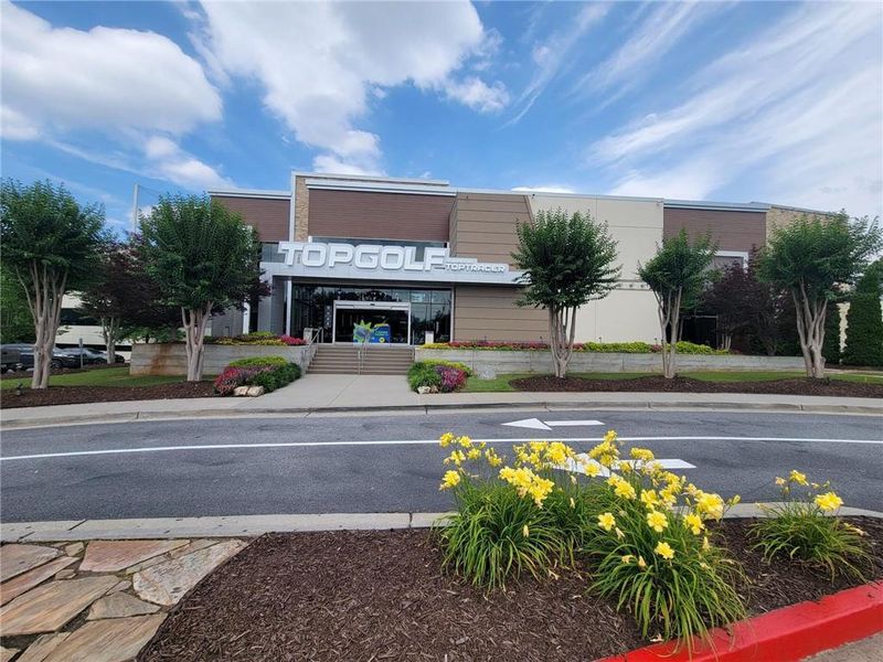 Front exterior of a new home in IveyBrooke, Alpharetta, GA, highlighting curb appeal (Image 21). Front exterior of a new home in IveyBrooke, Alpharetta, GA, highlighting curb appeal (Image 21).