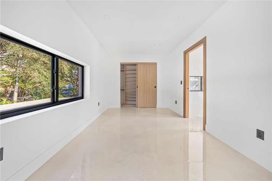 Spacious, unfurnished interior of a new home in , North Miami (Image 27).