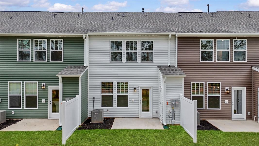 Two story townhome with large windows at Ransdell Pointe by DRB Homes in Spartanburg, SC