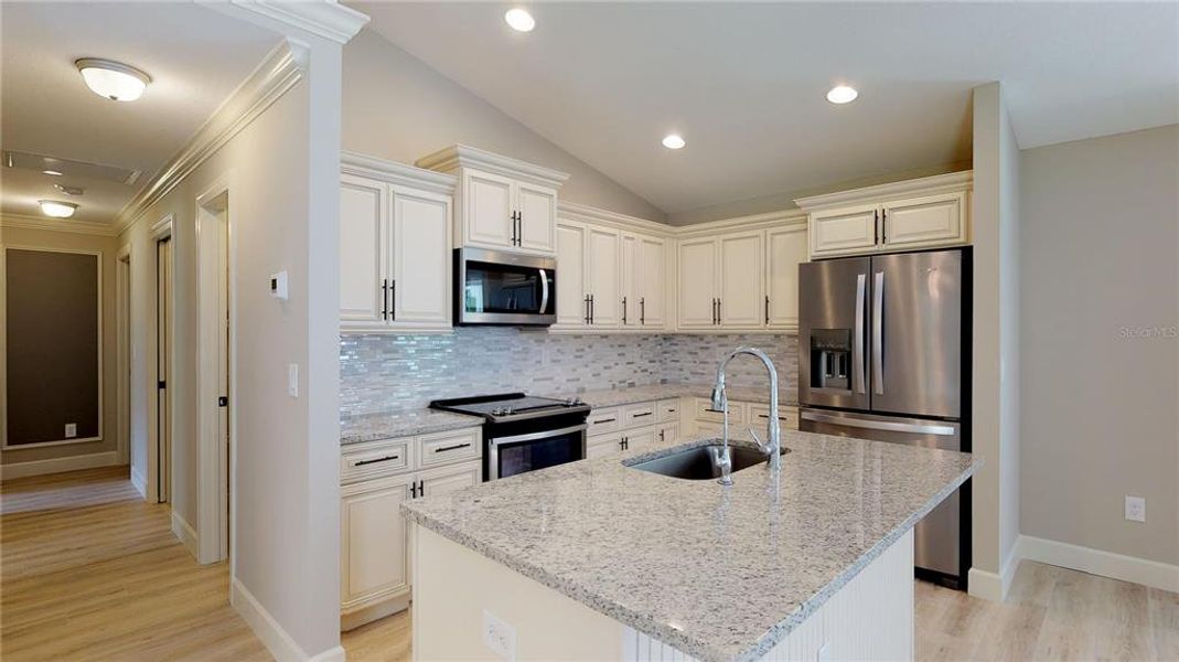 Furnished interior view inside a new home in , North Port (Image 4).