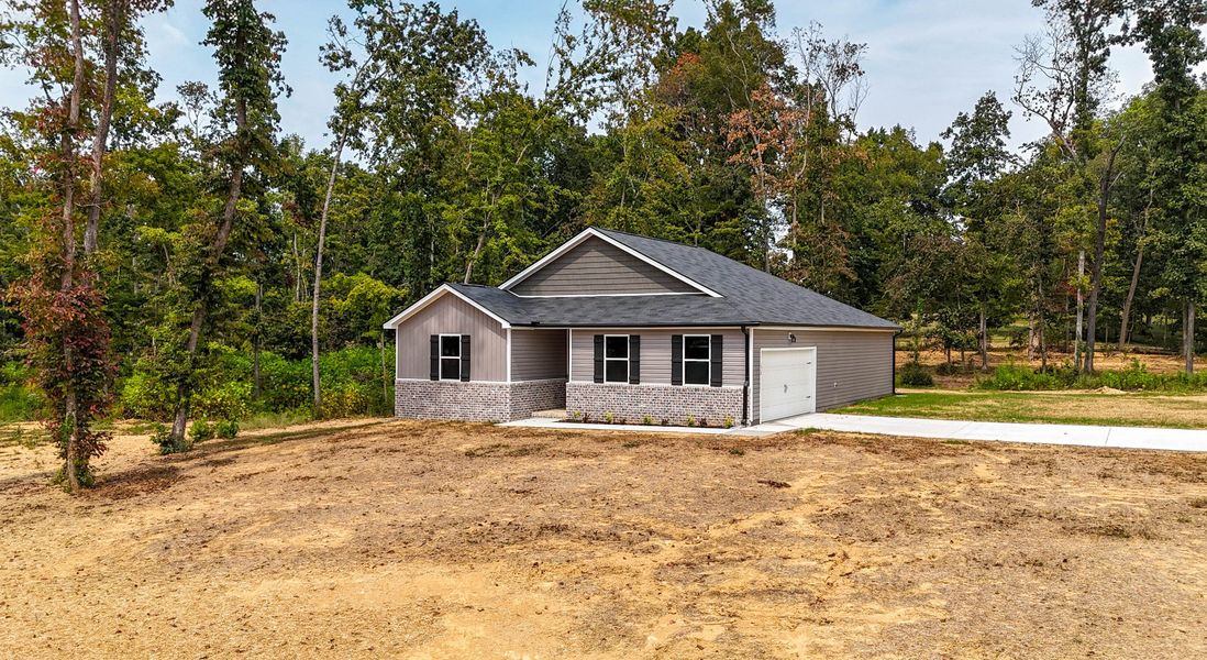 Front exterior of a home in the Woodland Farms community, located in Dickson, TN (Image 10). Front exterior of a home in the Woodland Farms community, located in Dickson, TN (Image 10).