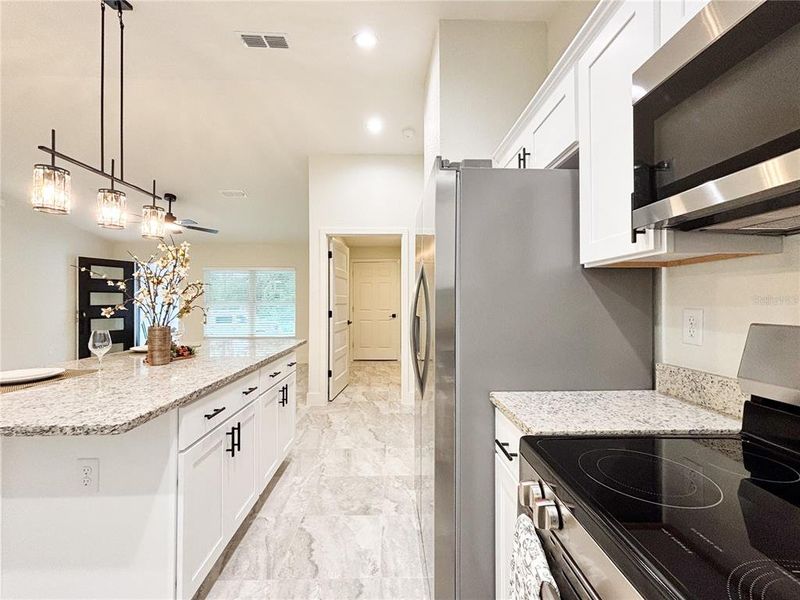 Furnished interior view inside a new home in , Dunnellon (Image 11).
