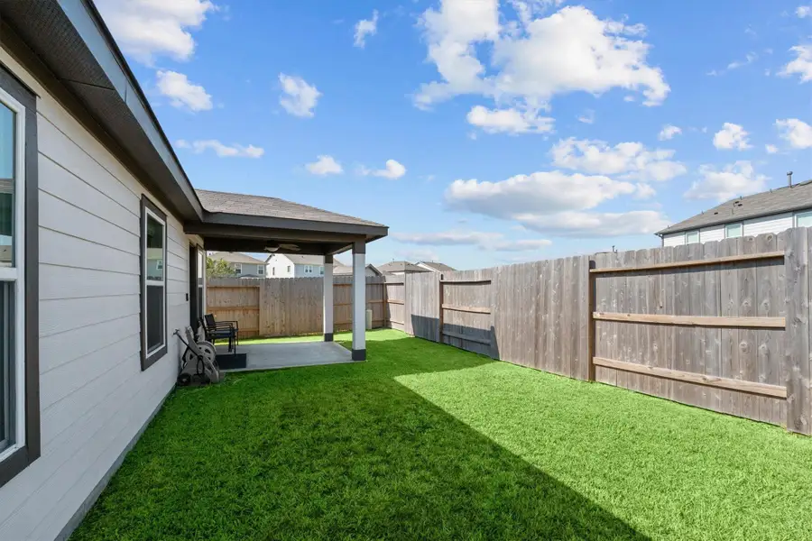 Exterior details and patio area of a home in , Houston (Image 4). Exterior details and patio area of a home in , Houston (Image 4).