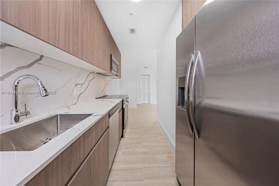 Furnished interior view inside a new home in , Miami (Image 11).