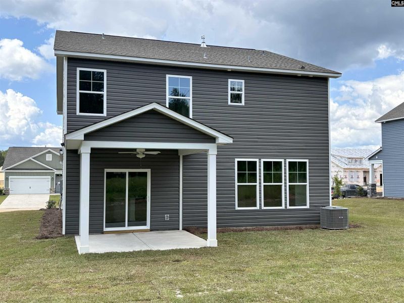 Front exterior of a new home in Rolling Hills, Prosperity, SC, highlighting curb appeal (Image 20).