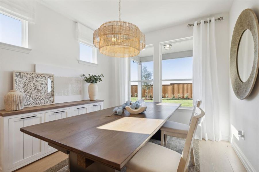 *Model Representation - Dining nook off kitchen with large windows