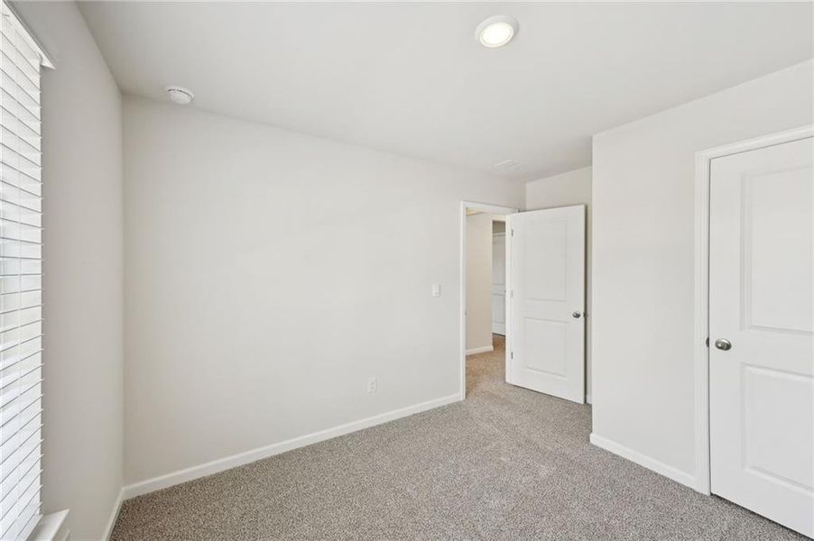 Spacious, unfurnished interior of a new home in Hawthorne Station, College Park (Image 19).