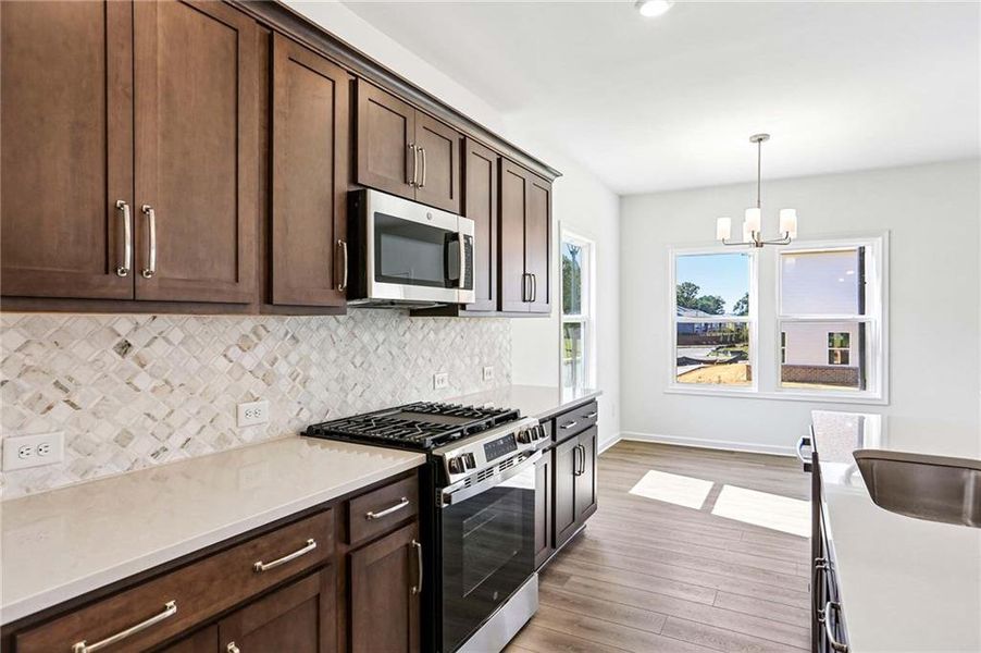 Furnished interior view inside a new home in Eastlyn Crossing, Flowery Branch (Image 5).