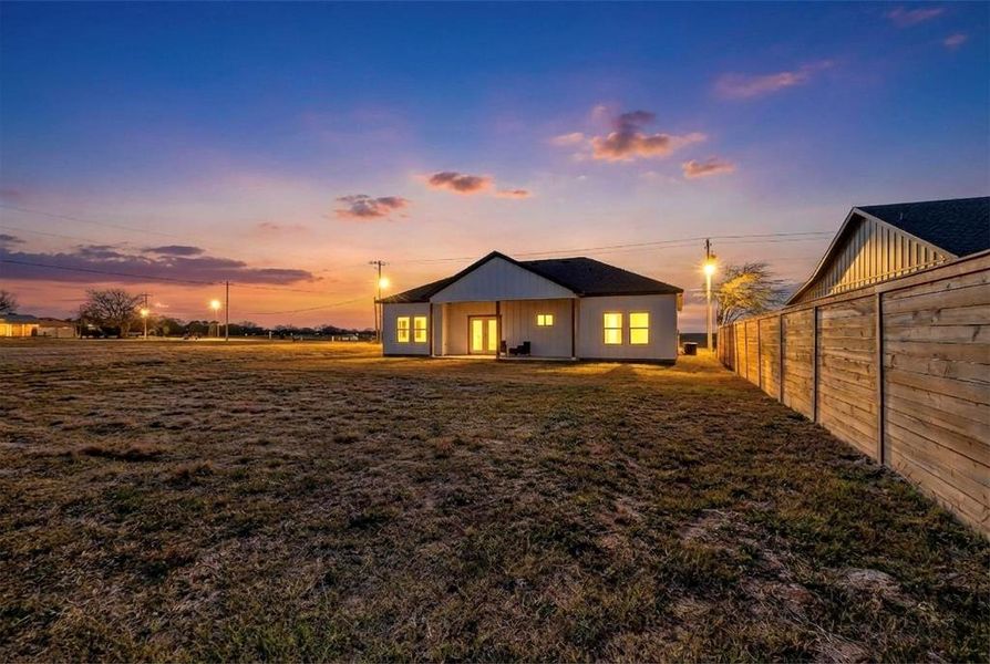 Back of property featuring a patio area