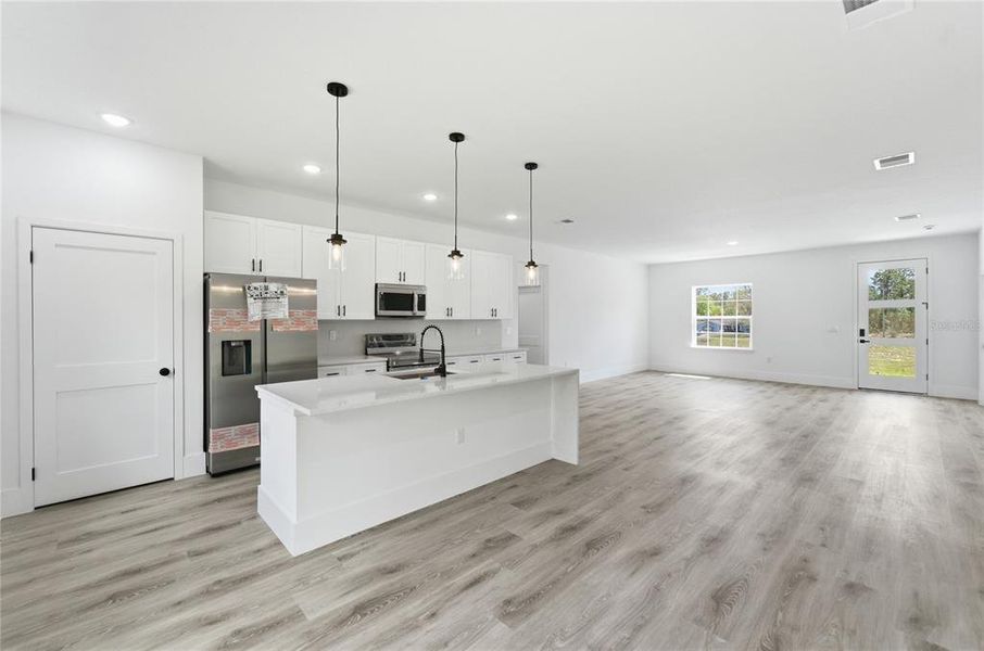 Furnished interior view inside a new home in , Dunnellon (Image 9).