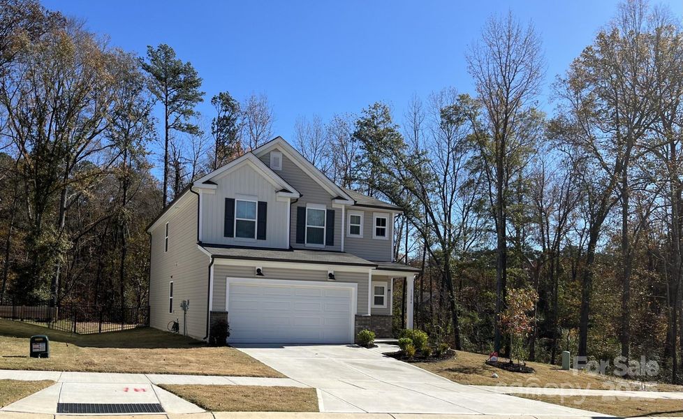 Front exterior of a new home in , Charlotte, NC, highlighting curb appeal (Image 2).
