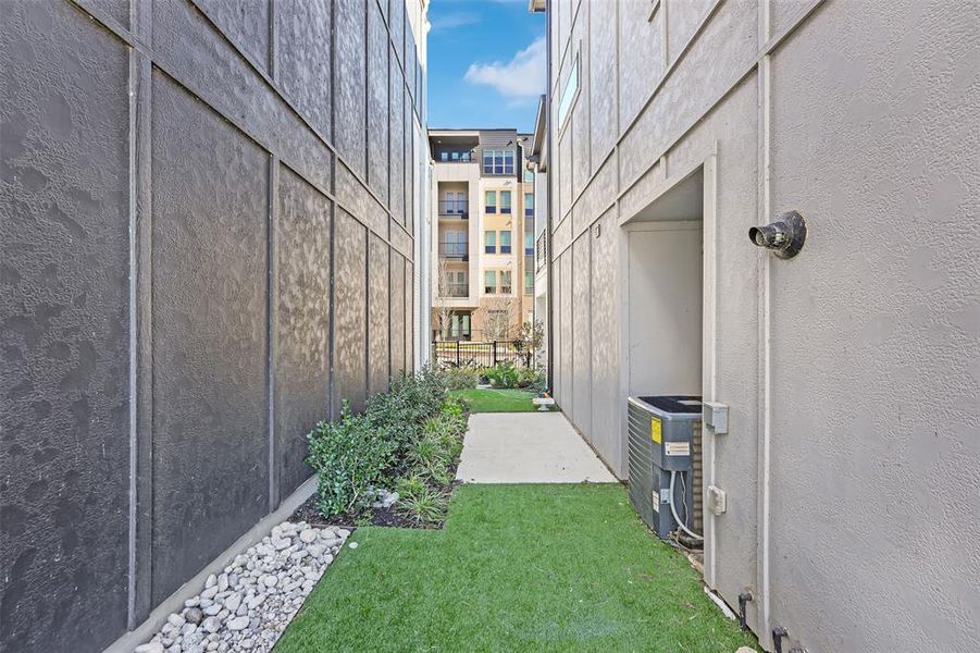 View of yard with cooling unit