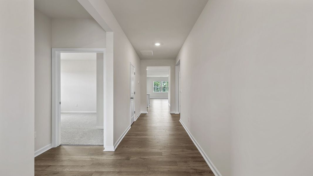 Spacious, unfurnished interior of a new home in Durbin Meadows Traditions, Fountain Inn (Image 11).