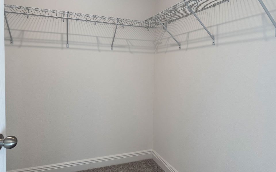Spacious Primary Closet with Ample Storage in Central Florida Home