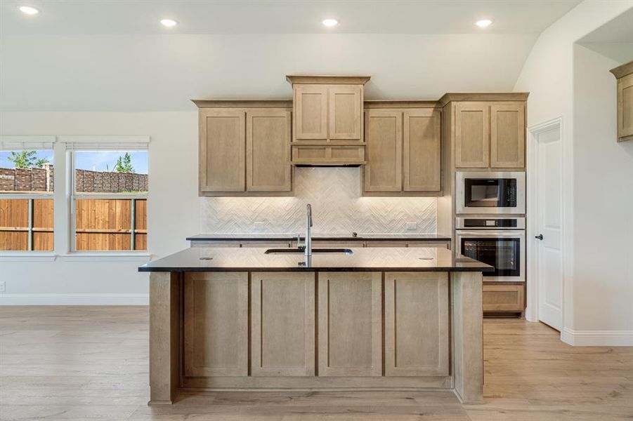 Furnished interior view inside a new home in Mockingbird Hills 60-65, Joshua (Image 8).