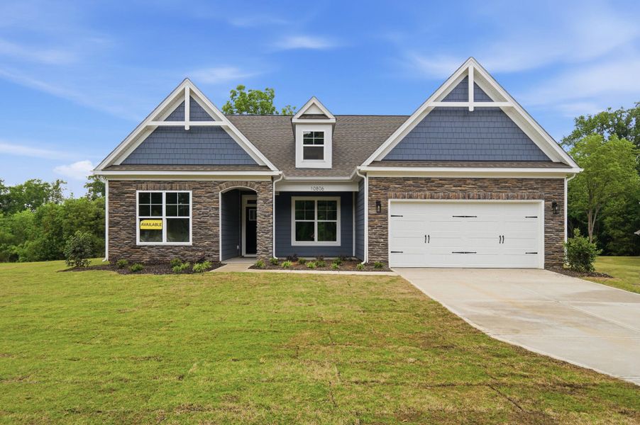 Front exterior of a new home in Chasewood, Mint Hill, NC, highlighting curb appeal (Image 1). Front exterior of a new home in Chasewood, Mint Hill, NC, highlighting curb appeal (Image 1).