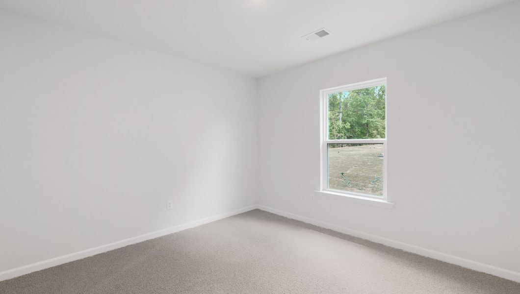 Spacious, unfurnished interior of a new home in Treemont Commons, Wellford (Image 19).