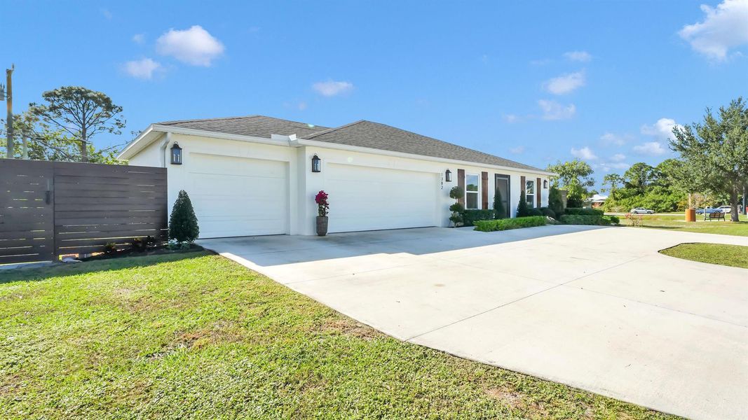 Front exterior of a new home in , Port St. Lucie, FL, highlighting curb appeal (Image 22). Front exterior of a new home in , Port St. Lucie, FL, highlighting curb appeal (Image 22).