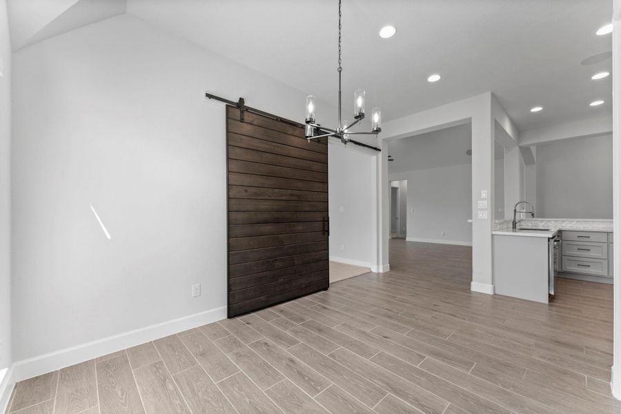 A cozy morning room filled with natural light and just off the kitchen. A cozy morning room filled with natural light and just off the kitchen.