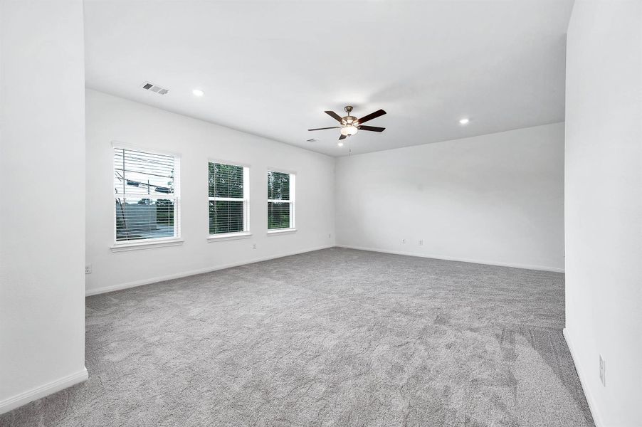 Large windows fill the living space with an abundance of natural light, creating a bright and comfortable environment for relaxing. Large windows fill the living space with an abundance of natural light, creating a bright and comfortable environment for relaxing.