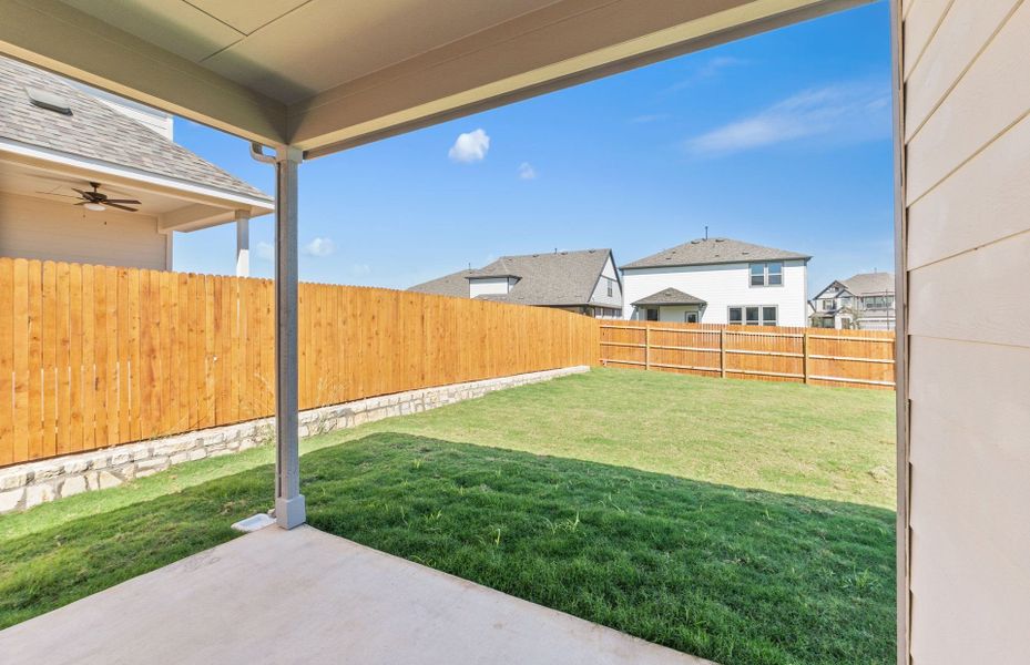 Exterior details and patio area of a home in Saddleback at Santa Rita Ranch, Liberty Hill (Image 19). Exterior details and patio area of a home in Saddleback at Santa Rita Ranch, Liberty Hill (Image 19).