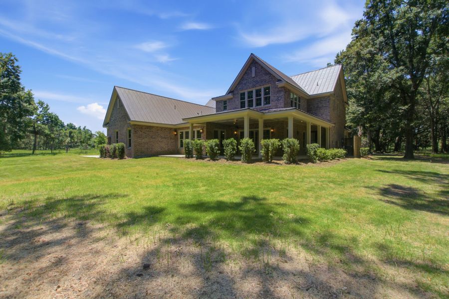 Exterior details and patio area of a home in , Johns Island (Image 35).